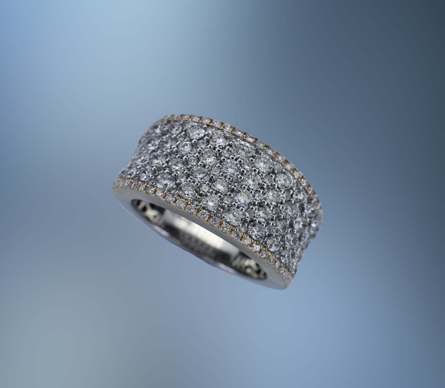 ONE 14KT WHITE AND YELLOW GOLD LADIES WEDDING BAND CONTAINING 172 NATURAL ROUND BRILLIANT CUT DIAMONDS TOTALING 2.87 CTS. ONE 14KT WHITE AND YELLOW GOLD LADIES WEDDING BAND CONTAINING 172 NATURAL ROUND BRILLIANT CUT DIAMONDS TOTALING 2.87 CTS.