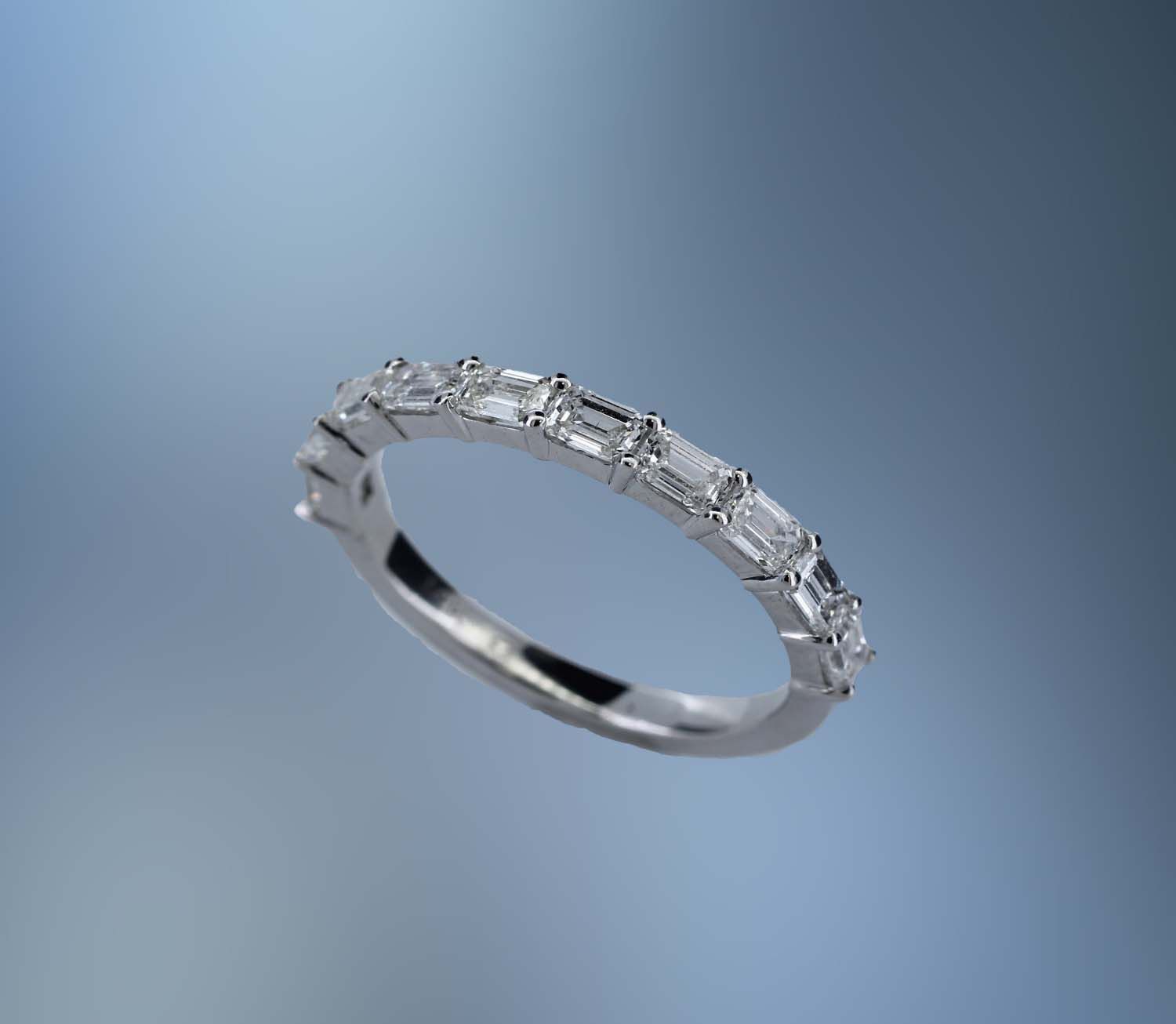 VK15W 14KT WHITE GOLD LADY'S DIAMOND WEDDING BAND FEATURING 10 EMERALD CUT DIAMONDS TOTALING 1.17 CTS VK15W 14KT WHITE GOLD LADY'S DIAMOND WEDDING BAND FEATURING 10 EMERALD CUT DIAMONDS TOTALING 1.17 CTS
