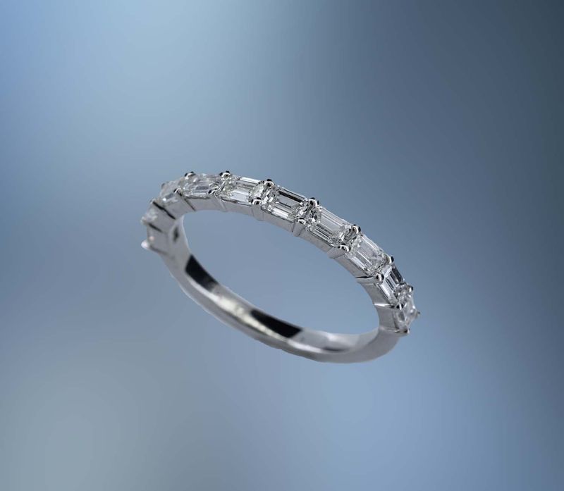 VK15W  14KT WHITE GOLD LADY'S DIAMOND WEDDING BAND FEATURING 10 EMERALD CUT DIAMONDS TOTALING 1.17 CTS