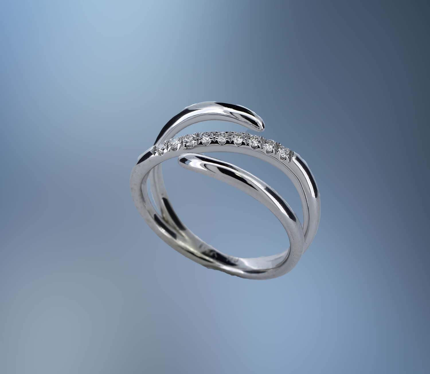 14KT WHITE GOLD DIAMOND FASHION RING FEATURING  9 ROUND BRILLIANT DIAMONDS TOTALING .14 CTS