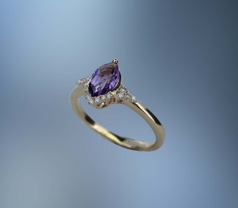 14KT YELLOW GOLD LADIES RING FEATURING ONE FANTASY CUT AMETHYST TOTALING 1.20 CTS AND 15 ROUND BRILLIANT CUT DIAMONDS TOTALING .10 CTS