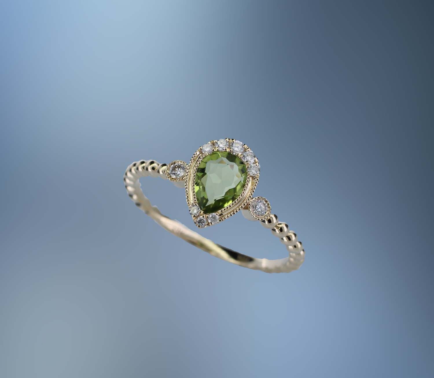 14KT YELLOW GOLD LADIES PERIDOT AND DIAMOND RING