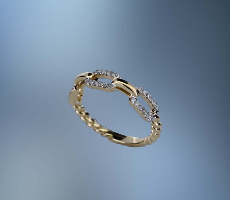14KT YELLOW GOLD FASHION  RING FEATURING (36) ROUND BRILLIANT CUT DIAMONDS TOTALING .18 CTS.