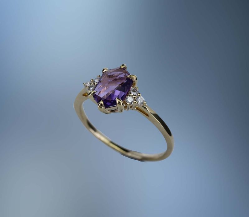 14KT YELLOW  GOLD LADY'S RING FEATURING  ONE FANTASY CUT AMETHYST TOTALING 1.09 CTS AND 6 ROUND BRILLIANT CUT DIAMONDS TOTALING .12 CTS.