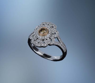 18KT WHITE  GOLD FASHION RING FEATURING A  FANCY BROWN DIAMOND TOTALING 0.23 CTS  &  96  ROUND BRILLIANT CUT  DIAMONDS TOTALING 0..41 CTS