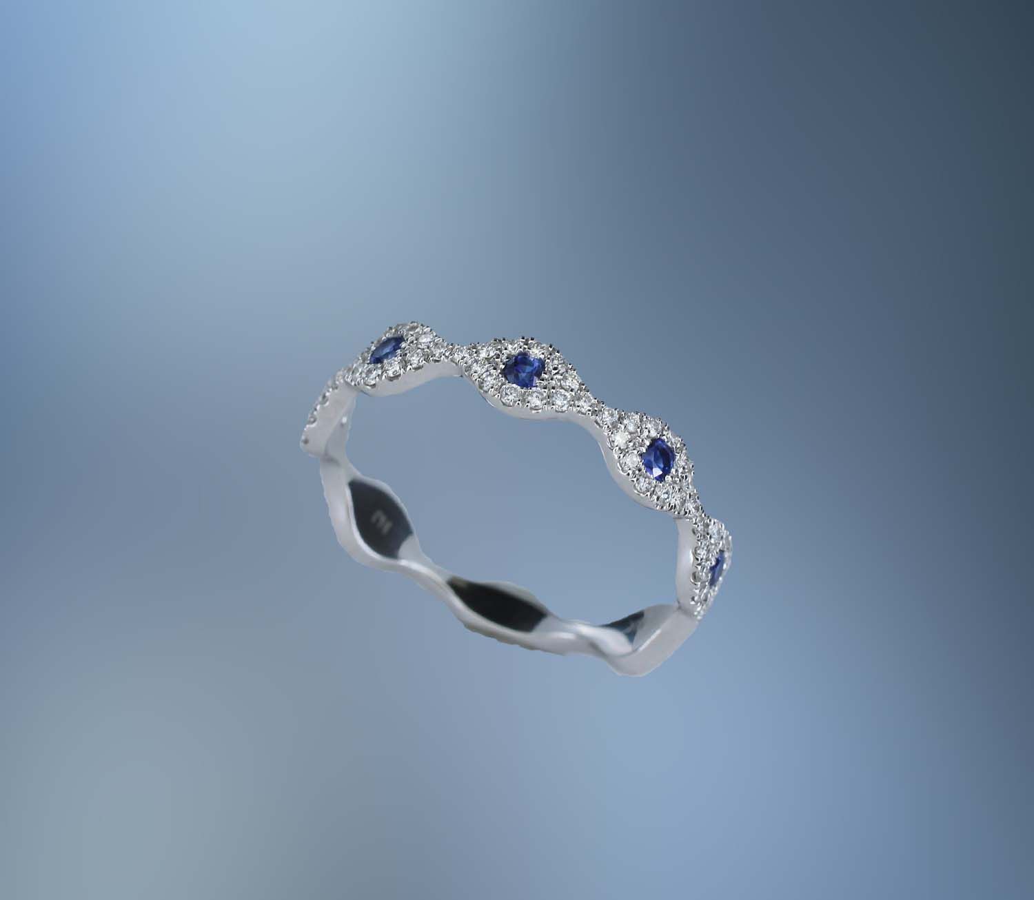 NJ4374S 14KT WHITE GOLD DIAMOND & SAPPHIRE BAND FEATURING 70 ROUND BRILLIANT CUT DIAMONDS TOTALING .25 CTS & 5 ROUND SAPPHIRES TOTALING .18 CTS. WEIGHT .43 CTS NJ4374S 14KT WHITE GOLD DIAMOND & SAPPHIRE BAND FEATURING 70 ROUND BRILLIANT CUT DIAMONDS TOTALING .25 CTS & 5 ROUND SAPPHIRES TOTALING .18 CTS. WEIGHT .43 CTS
