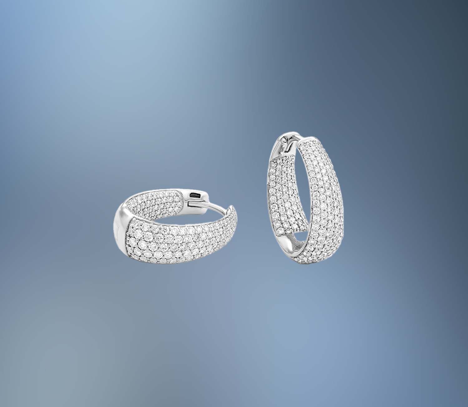 ONE PAIR OF 14KT WHITE GOLD LADIES DIAMOND HOOP EARRINGS