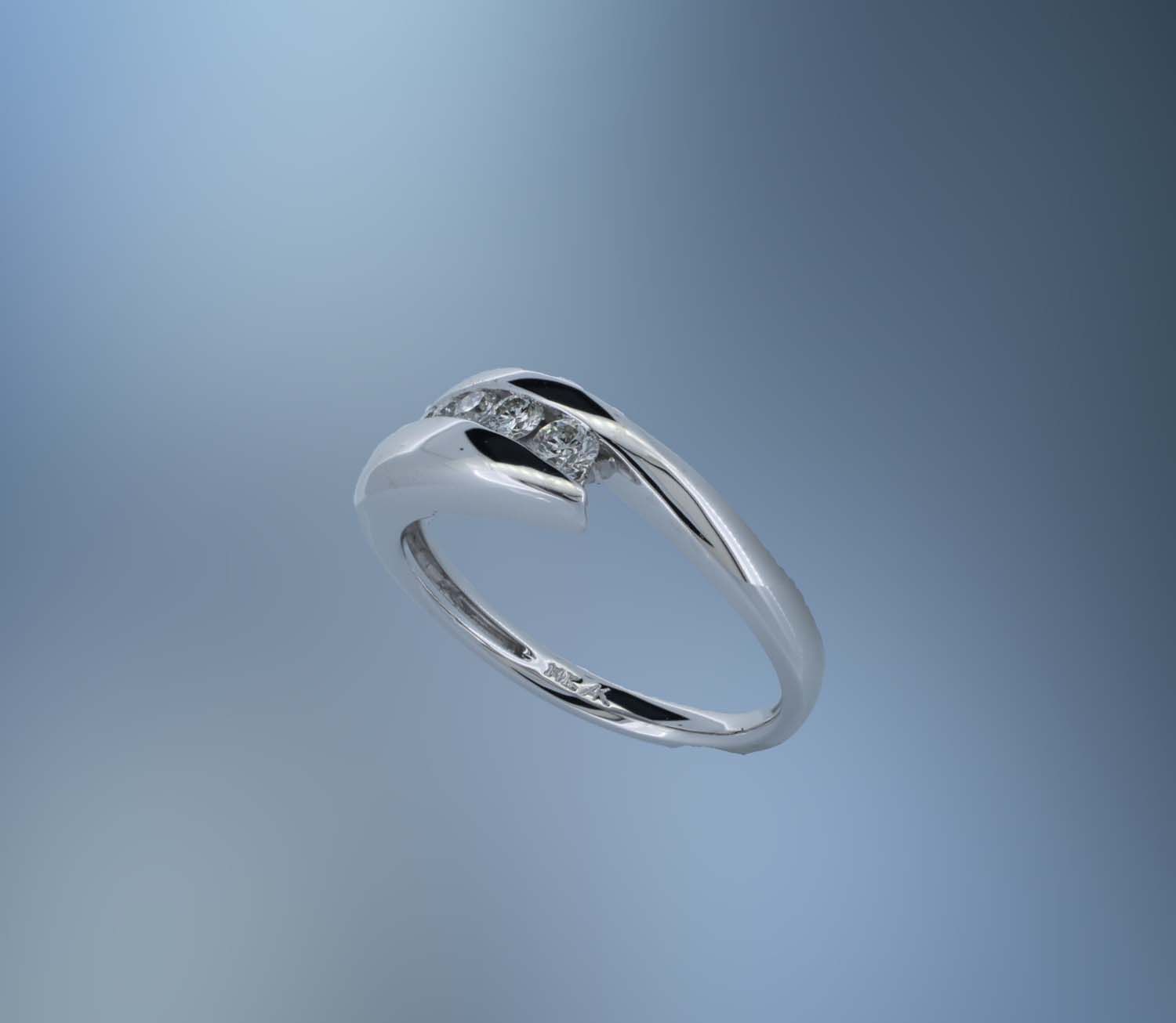 ONE 14KT WHITE GOLD LADIES DIAMOND FASHION RING CONTAINING .21 CTS. OF NATURAL ROUND BRILLIANT CUT DIAMONDS