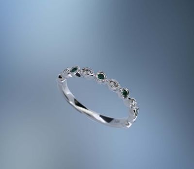 ONE 14KT WHITE GOLD LADIES EMERALD  AND DIAMOND RING CONTAINING .08 CTS. OF ROUND BRILLIANT CUT NATURAL DIAMONDS, AND .12 CTS. OF ROUND BRILLIANT CUT SAPPHIRES.
