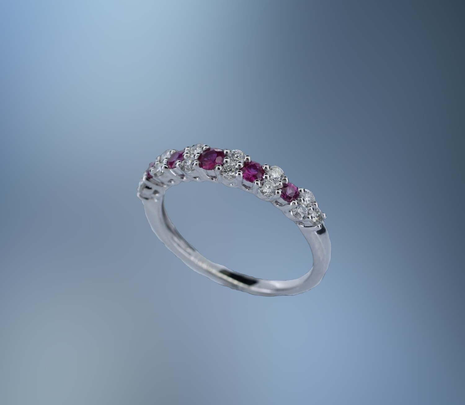 ONE 14KT WHITE GOLD LADYS NATURAL RUBY AND DIAMOND RING CONTAINING .35 CTTW OF NATURAL ROUND BRILLIANT CUT DIAMONDS AND .31 CTTW OF NATURAL ROUND BRILLIANT CUT RUBYS