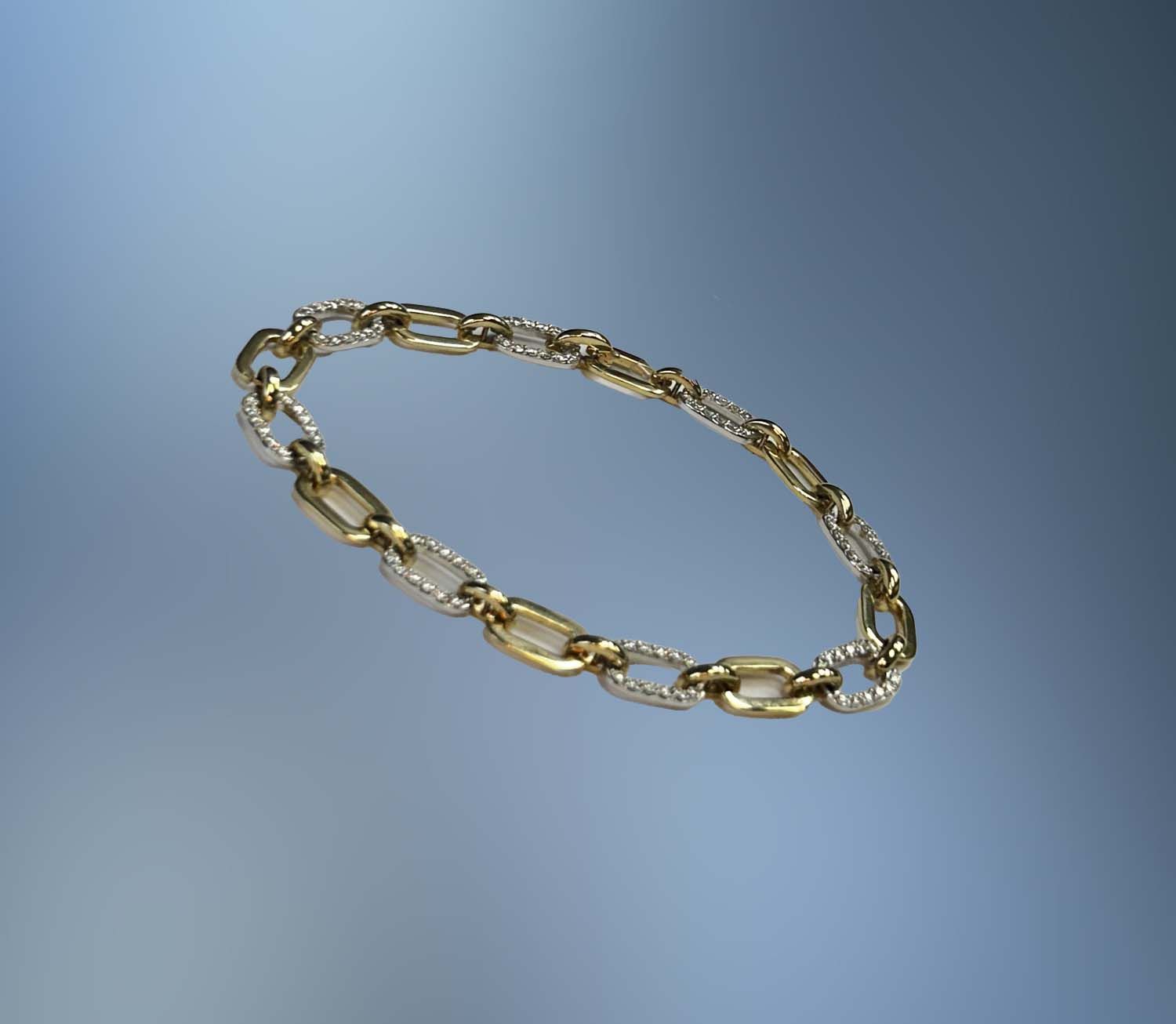 14KT TWO TONE DIAMOND BRACELET FEATURING 1.10 CTS OF ROUND BRILLIANT DIAMONDS