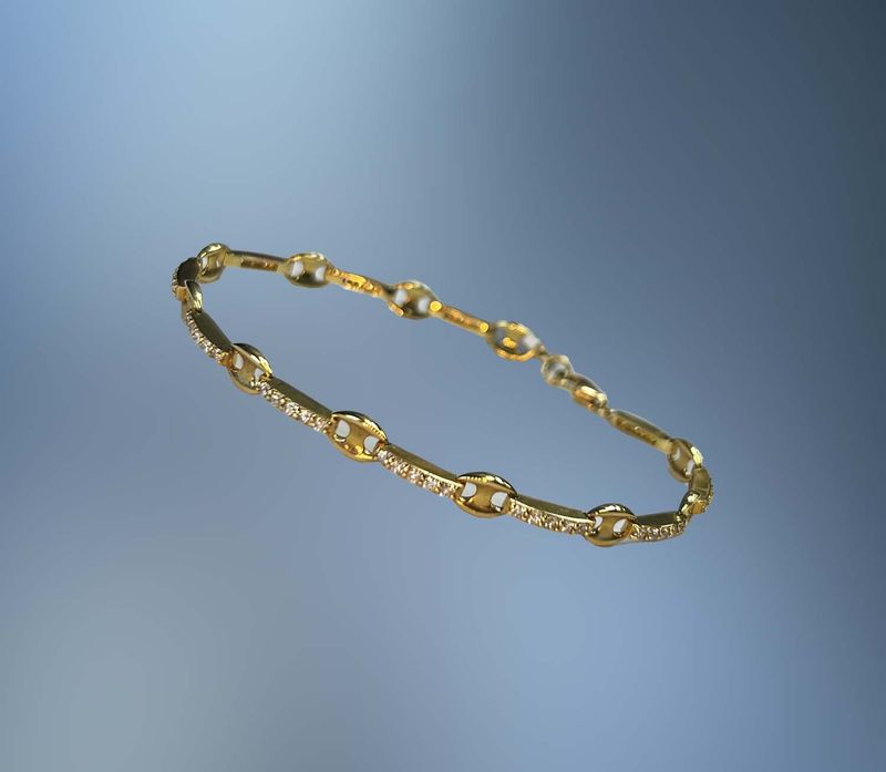 18KT YELLOW GOLD BRACELET FEATURING 55 ROUND BRILLIANT DIAMOND TOTALING .90 CTS