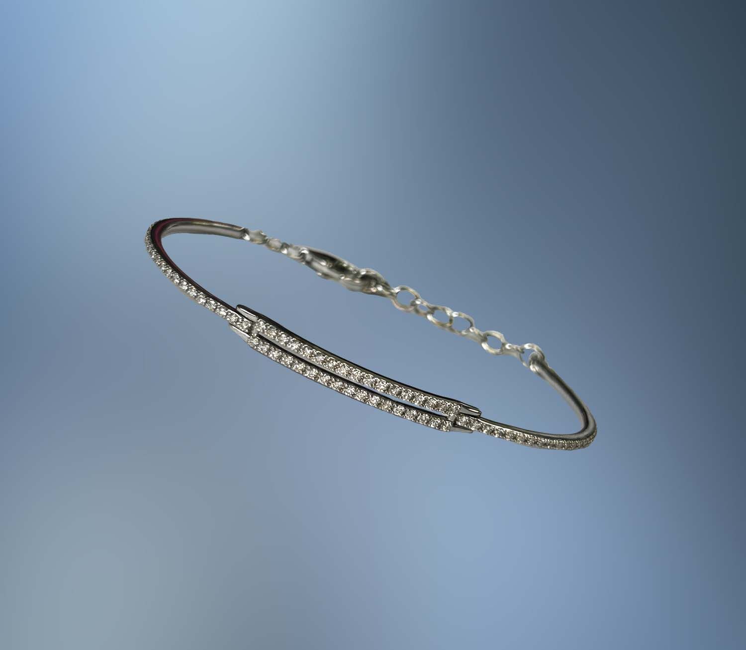 18 KT WHITE GOLD LADIES DIAMOND BRACELET FEATURING 94 ROUND BRILLIANT CUT DIAMONDS TOTALING 1.09 CTS 18 KT WHITE GOLD LADIES DIAMOND BRACELET FEATURING 94 ROUND BRILLIANT CUT DIAMONDS TOTALING 1.09 CTS