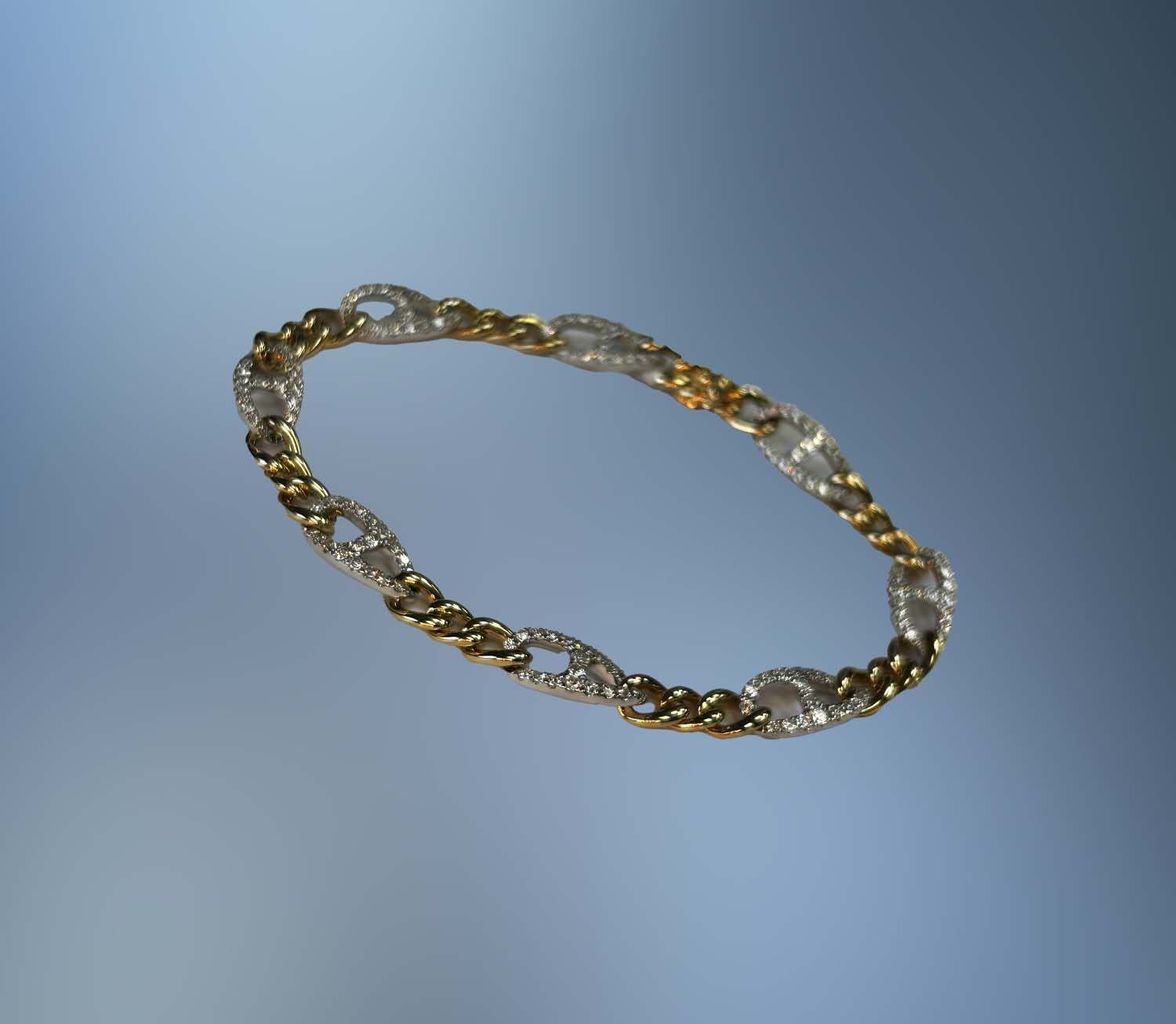 ONE 14KT YELLOW AND WHITE GOLD DIAMOND BRACELET CONTAINING 1.64 CTS OF NATURAL ROUND BRILLIANT CUT DIAMONDS WITH A HIDDEN BOX CLOSURE. BRACELET IS 7 ONE 14KT YELLOW AND WHITE GOLD DIAMOND BRACELET CONTAINING 1.64 CTS OF NATURAL ROUND BRILLIANT CUT DIAMONDS WITH A HIDDEN BOX CLOSURE. BRACELET IS 7" IN LENGTH