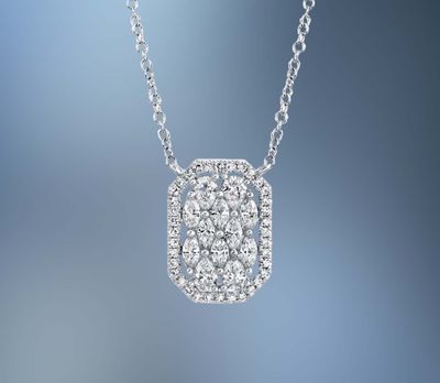 14KT WHITE GOLD DIAMOND PENDANT FEATURING 4 PEAR SHAPED DIAMONDS, 8 MARQUISE SHAPED DIAMONDS, AND 35 ROUND BRILLIANT CUT DIAMONDS TOTALING 0.62 CTS.