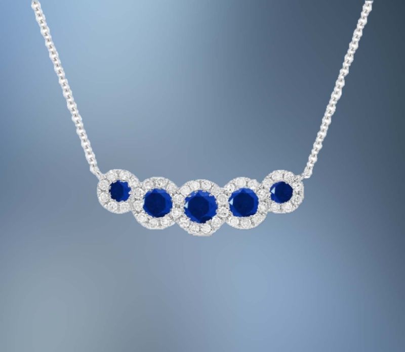 14 KARAT WHITE GOLD NATURAL BLUE SAPPHIRE AND DIAMOND PENDANT