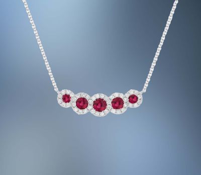 14 KARAT WHITE GOLD NATURAL RUBY AND DIAMOND PENDANT