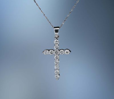 14KT WHITE GOLD DIAMOND CROSS PENDANT FEATURING 12 ROUND BRILLIANT DIAMONDS TOTALING 1.12 CTS 14KT WHITE GOLD DIAMOND CROSS PENDANT FEATURING 12 ROUND BRILLIANT DIAMONDS TOTALING 1.12 CTS