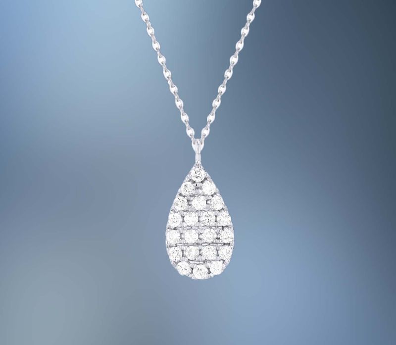 14KT WHITE GOLD PEAR SHAPE DIAMOND PENDANT FEATURING 21 ROUND BRILLIANT CUT DIAMONDS TOTALING 0.14 CTS