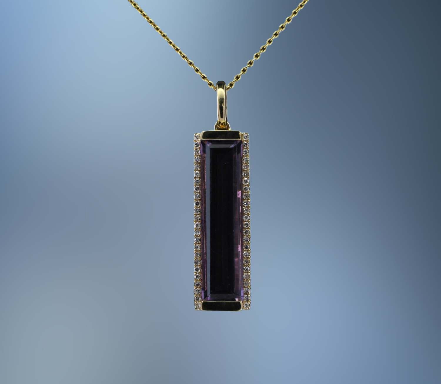 14KT YELLOW GOLD AMETHYST & DIAMOND PENDANT FEATURING 48 ROUND BRILLIANT DIAMONDS TOTALING .10 CTS & ONE 3.32 AMETHYST STONE 14KT YELLOW GOLD AMETHYST & DIAMOND PENDANT FEATURING 48 ROUND BRILLIANT DIAMONDS TOTALING .10 CTS & ONE 3.32 AMETHYST STONE