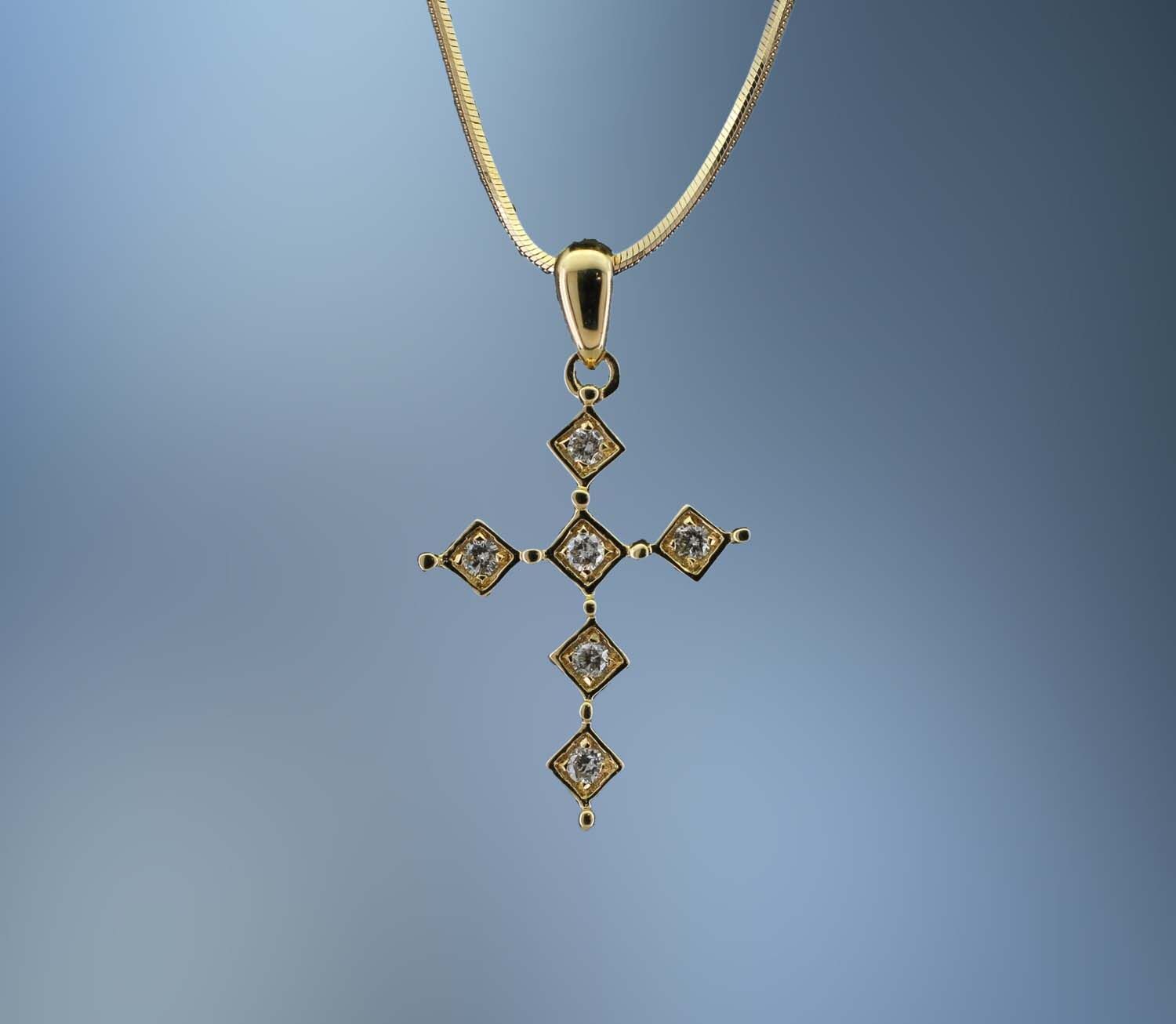 14KT YELLOW GOLD AND DIAMOND PENDANT  FEATURING  6 ROUND BRILLIANT CUT DIAMONDS TOTALING  0 .09 CTS