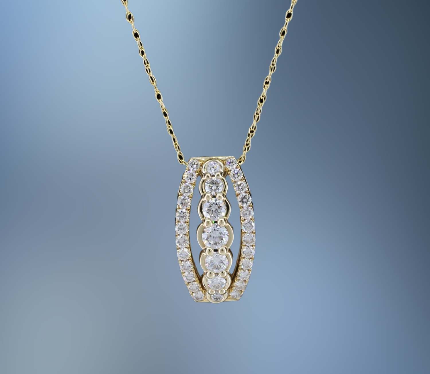 14KT YELLOW GOLD DIAMOND PENDANT FEATURING 31 ROUND BRILLIANT CUT DIAMONDS TOTALING 1.00 CTS