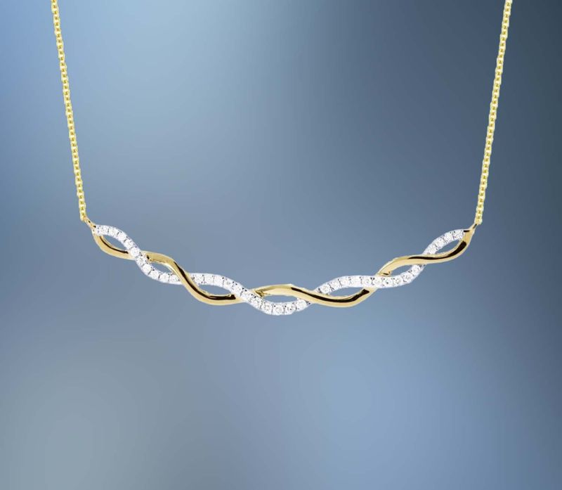 14KT YELLOW GOLD DIAMOND PENDANT FEATURING  35 R0UND BRILLIANT CUT DIAMONDS TOTALING 0.16 CTS