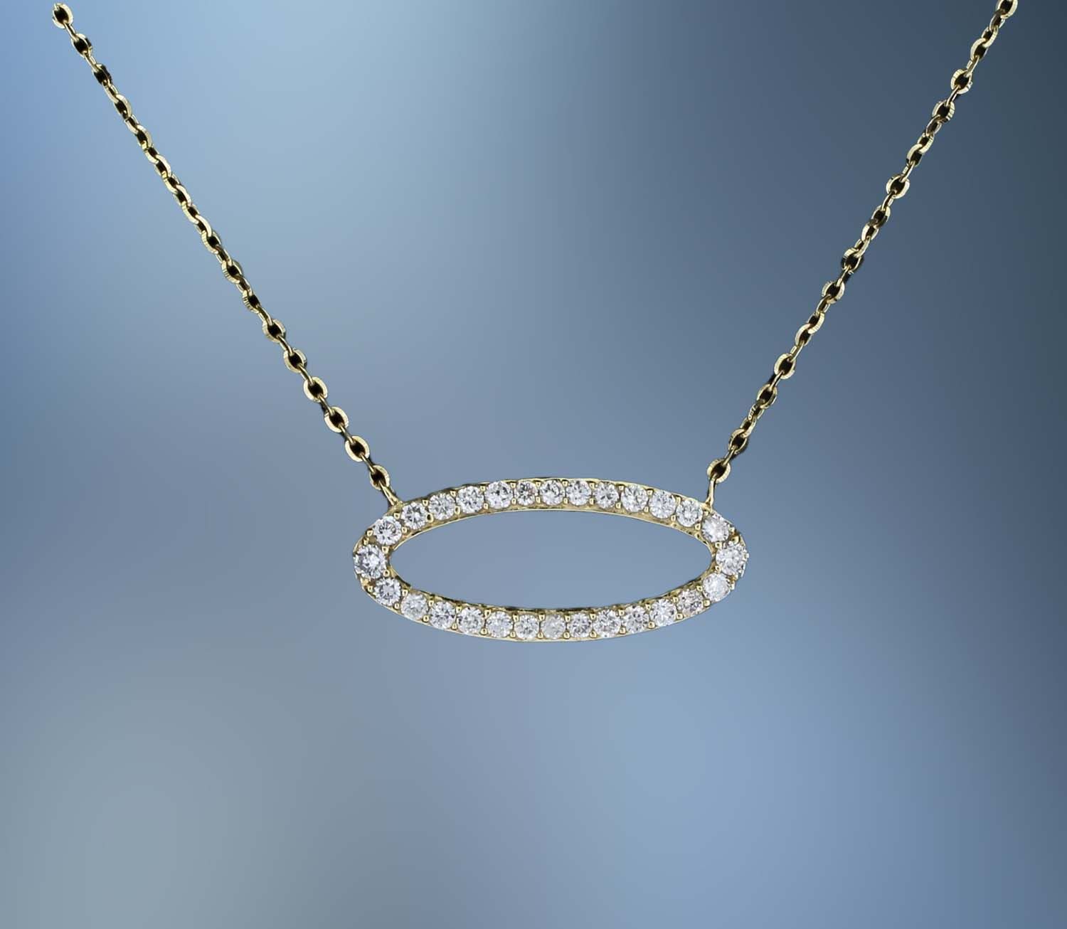 14KT YELLOW GOLD OVAL DIAMOND NECKLACE FEATURING 28 ROUND BRILLIANT CUT DIAMONDS TOTALING 0.22 CTS. 14KT YELLOW GOLD OVAL DIAMOND NECKLACE FEATURING 28 ROUND BRILLIANT CUT DIAMONDS TOTALING 0.22 CTS.