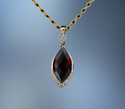CM3980Y 14KT YELLOW GOLD DIAMOND & GARNET PENDANT FEATURING .10 CTS OF ROUND BRILLIANT DIAMONDS & ONE MARQ CUT GARNET TOTALING 1.10 CTS CM3980Y 14KT YELLOW GOLD DIAMOND & GARNET PENDANT FEATURING .10 CTS OF ROUND BRILLIANT DIAMONDS & ONE MARQ CUT GARNET TOTALING 1.10 CTS