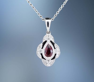 CM4258W 14KT WHITE GOLD LADY'S RUBY AND DIAMOND PENDANT FEATURING ONE .27 CT PEAR SHAPED RUBY WITH 12 ROUND BRILLIANT CUT DIAMONDS TOTALING .06 CTS. MILLGRAIN DESIGN THROUGH OUT CM4258W 14KT WHITE GOLD LADY'S RUBY AND DIAMOND PENDANT FEATURING ONE .27 CT PEAR SHAPED RUBY WITH 12 ROUND BRILLIANT CUT DIAMONDS TOTALING .06 CTS. MILLGRAIN DESIGN THROUGH OUT