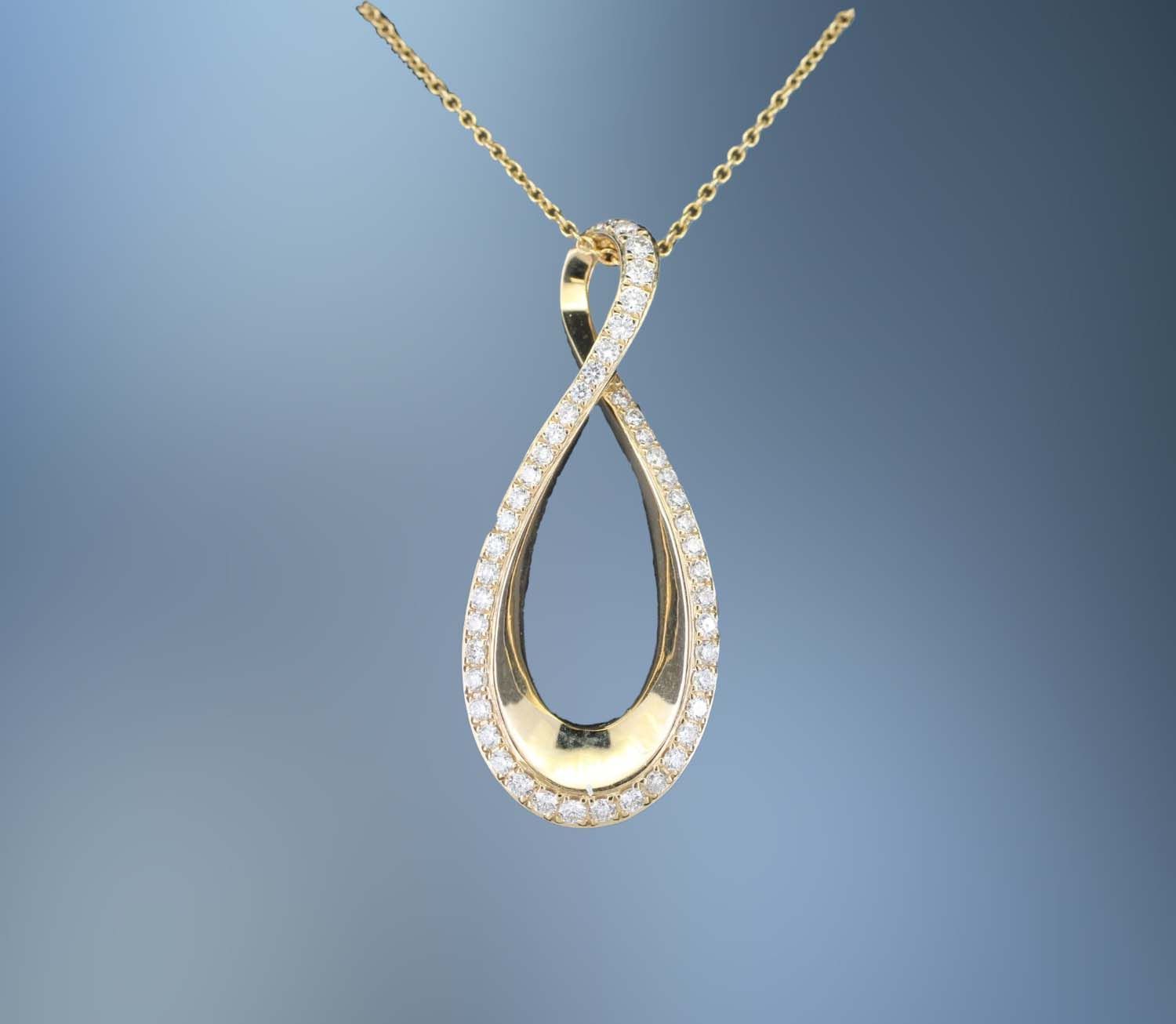 ONE 14KT YELLOW GOLD LADYS DIAMOND PENDANT CONTAINING .38 CT TOTAL WEIGHT OF NATURAL ROUND BRILLIANT CUT DIAMONDS ON AN 18" CHAIN WITH A LOBSTER CLAW CLASP.