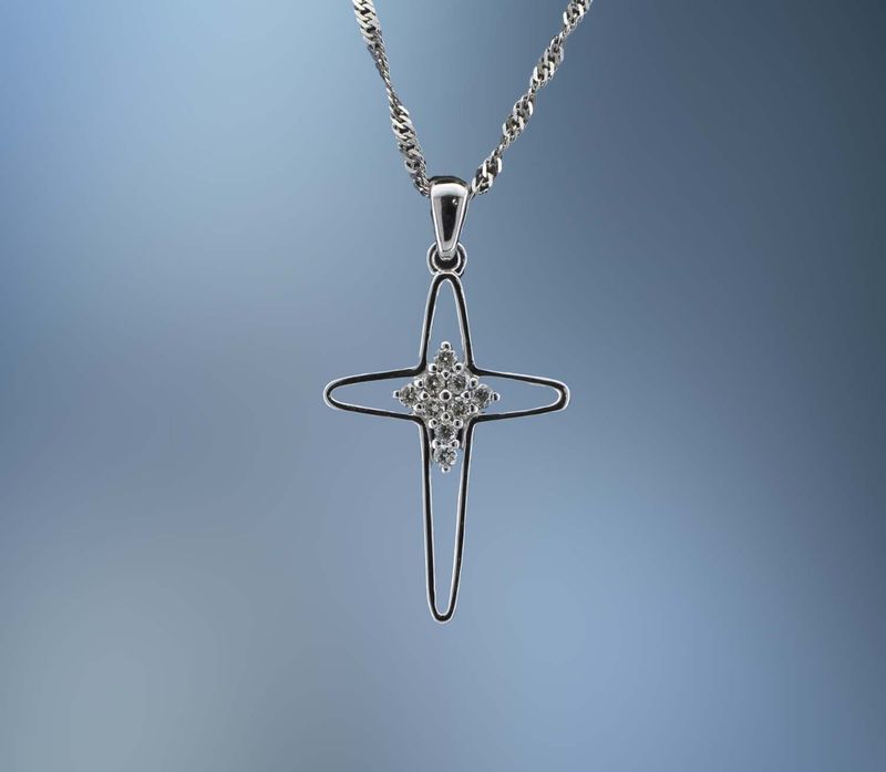 TP2233W  14KT WHITE GOLD AND DIAMOND CROSS PENDANT  FEATURING 9 ROUND BRILLIANT CUT DIAMONDS TOTALING 0.10 CTS