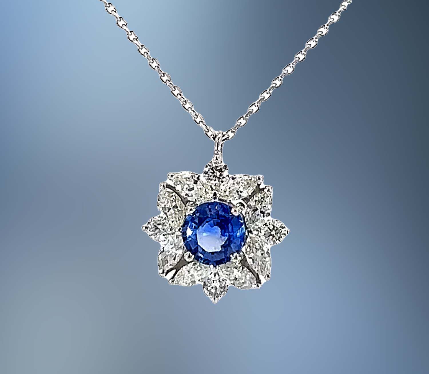 1 18KT WG BLUE SAPPHIRE PENDANT