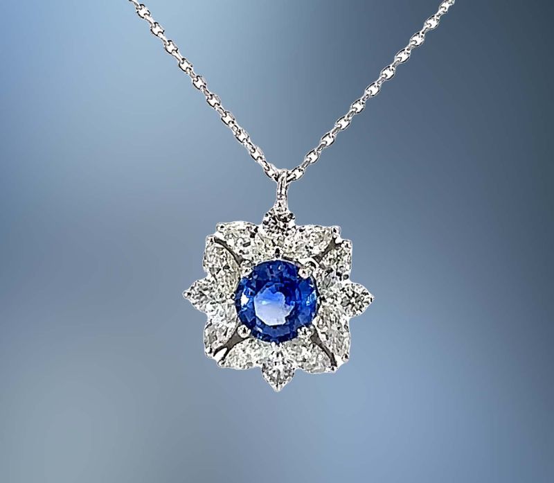 1 18KT WG BLUE SAPPHIRE PENDANT