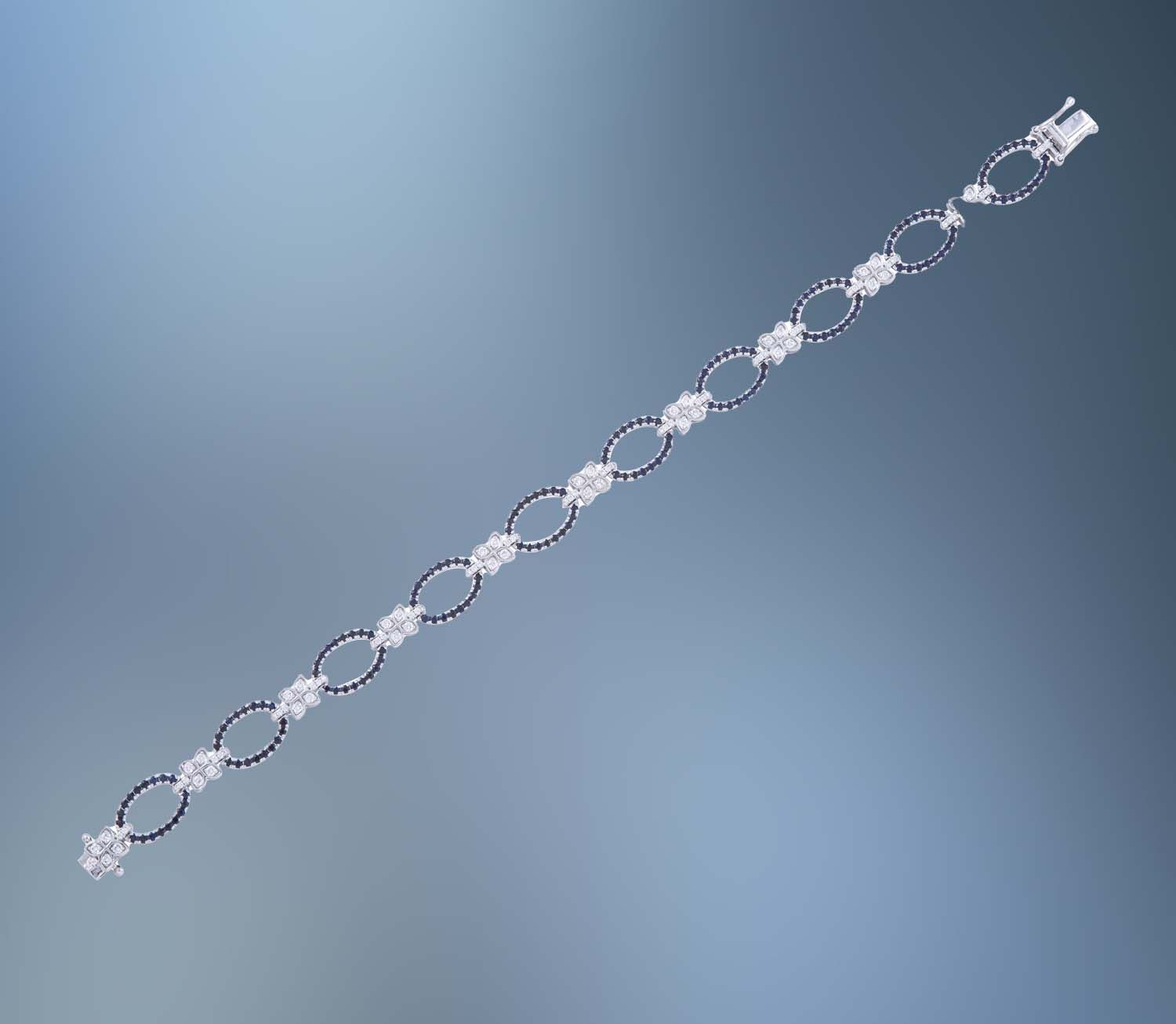 ONE 14KT WHITE GOLD LADIES  LINK BLUE SAPPHIRE AND DIAMOND BRACELET