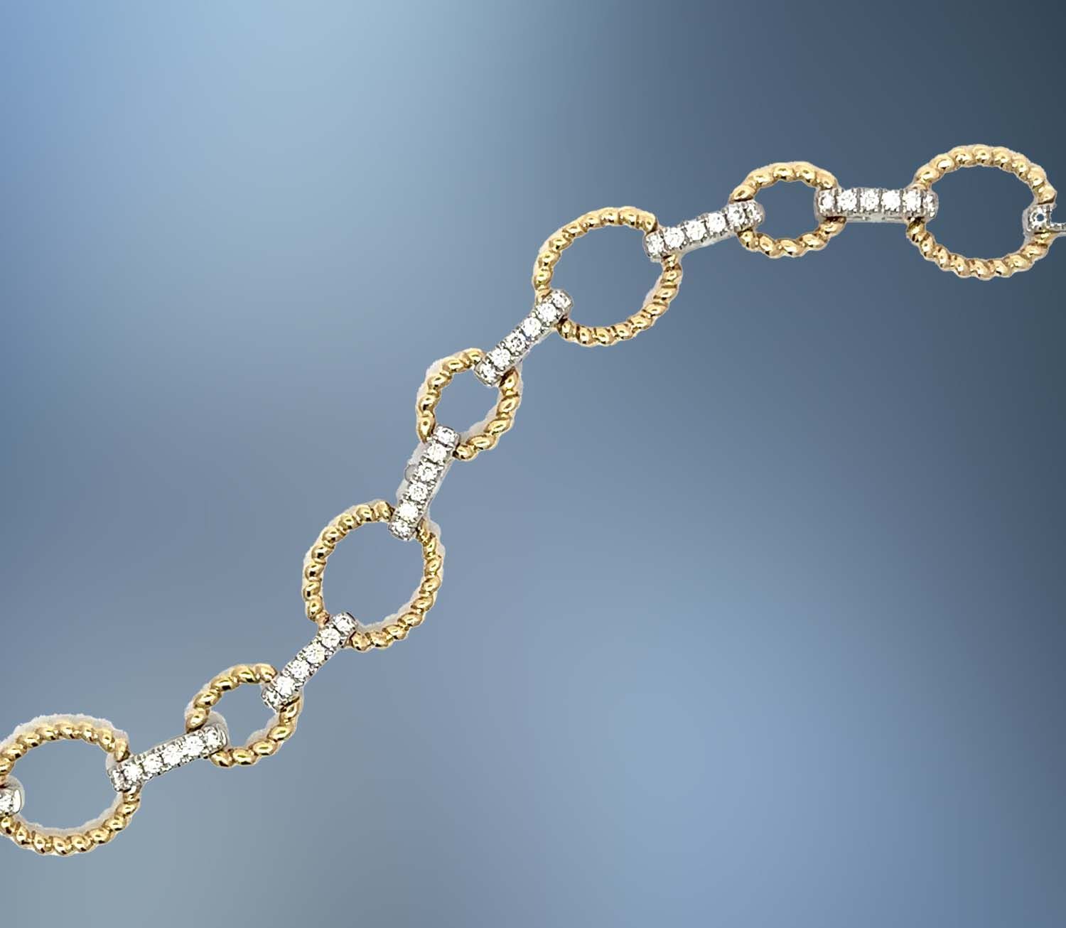 ONE 14KT TWO TONED OVAL LINK DIAMOND BRACELET