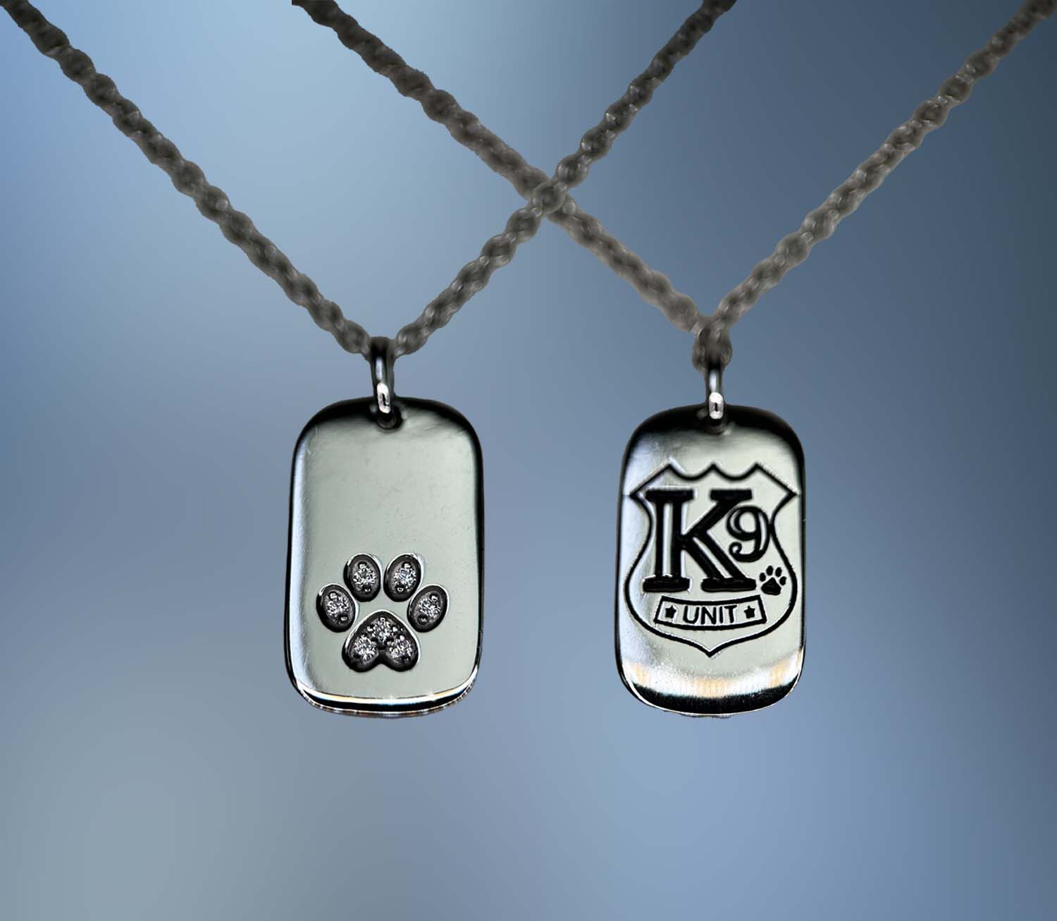 ONE STERLING SILVER DOG TAG NECKLACE WITH THE K9 LOGO AND .11 CTS OF CZ'S