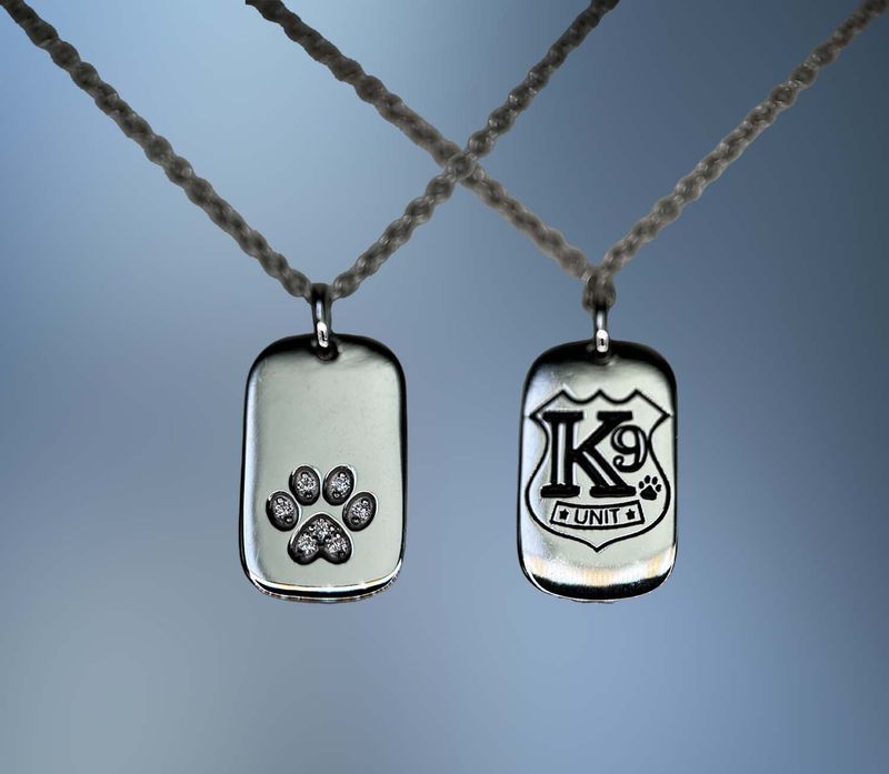 ONE STERLING SILVER DOG TAG NECKLACE WITH THE K9 LOGO AND .11 CTS OF CZ'S