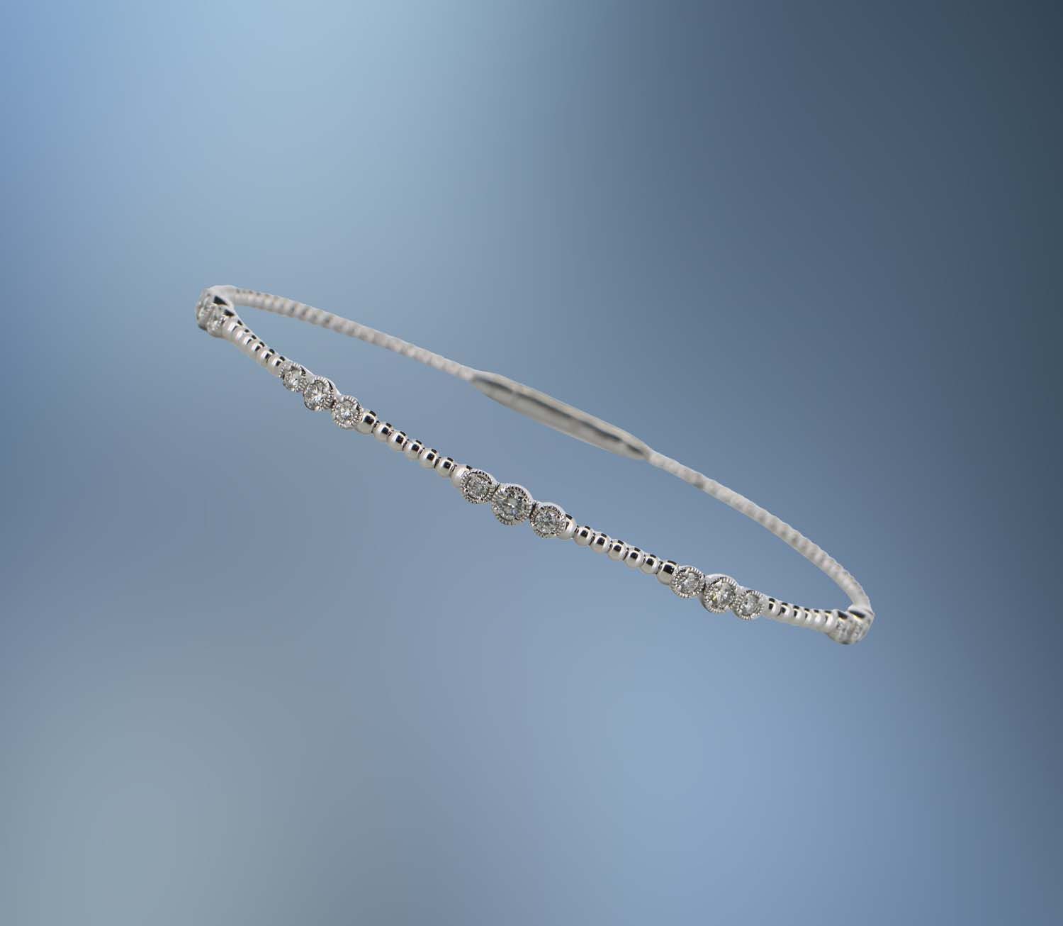 ONE 14KT WHITE GOLD DIAMOND FLEXIBLE BRACELET