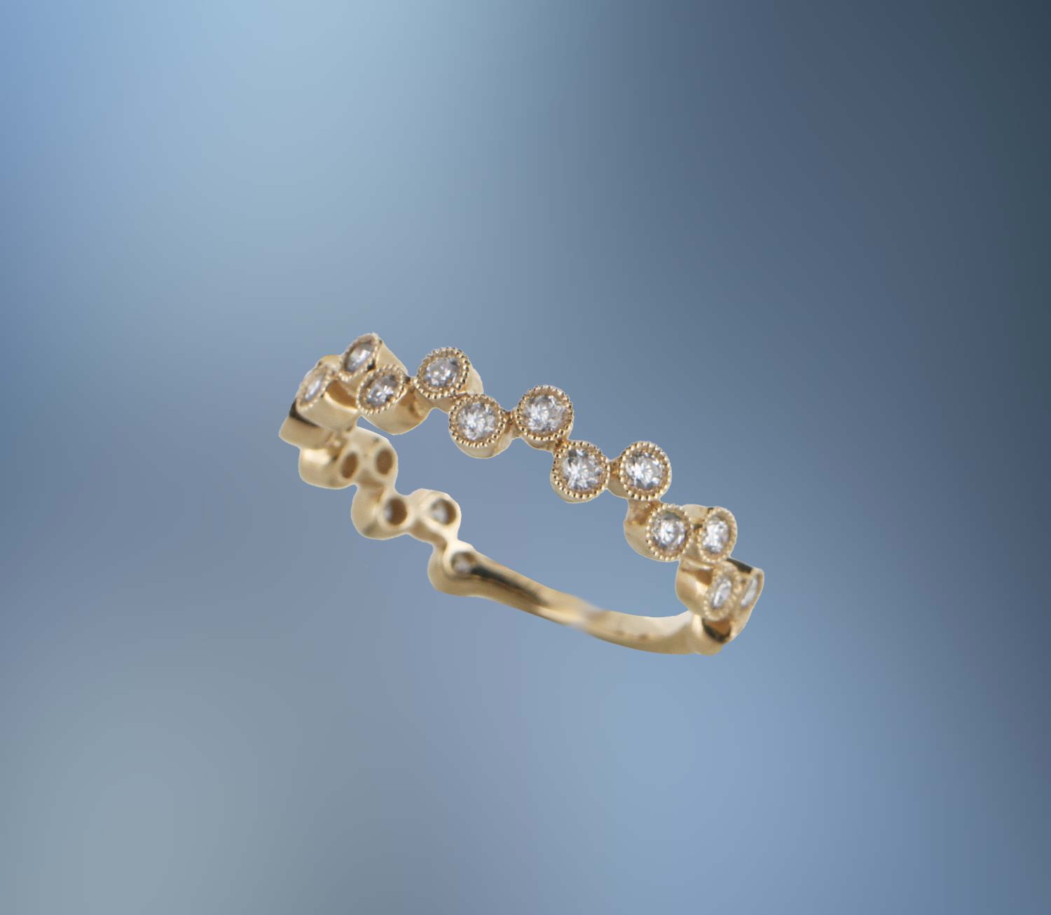 14 KT YELLOW GOLD DIAMOND ANNIVERSARY BAND FEATURING 22 ROUND BRILLIANT CUT DIAMONDS TOTALING 0.50 CTS