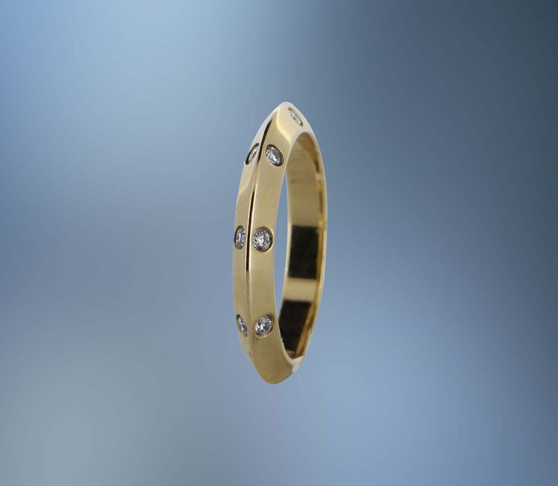 CM10261 14KT YELLOW GOLD LADY'S RING FEATURING 8 ROUND BRILLIANT CUT DIAMONDS TOTALING .16 CTS