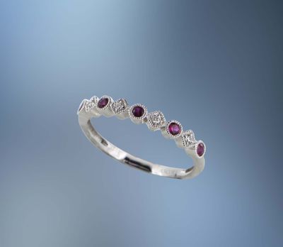 14K WHITE GOLD DIAMOND AND RUBY BAND FEATURING 5 ROUND RUBIES TOTALING 0.23 CTS AND 4 ROUND BRILLIANT CUT DIAMONDS TOTALING 0.05 CTS 14K WHITE GOLD DIAMOND AND RUBY BAND FEATURING 5 ROUND RUBIES TOTALING 0.23 CTS AND 4 ROUND BRILLIANT CUT DIAMONDS TOTALING 0.05 CTS