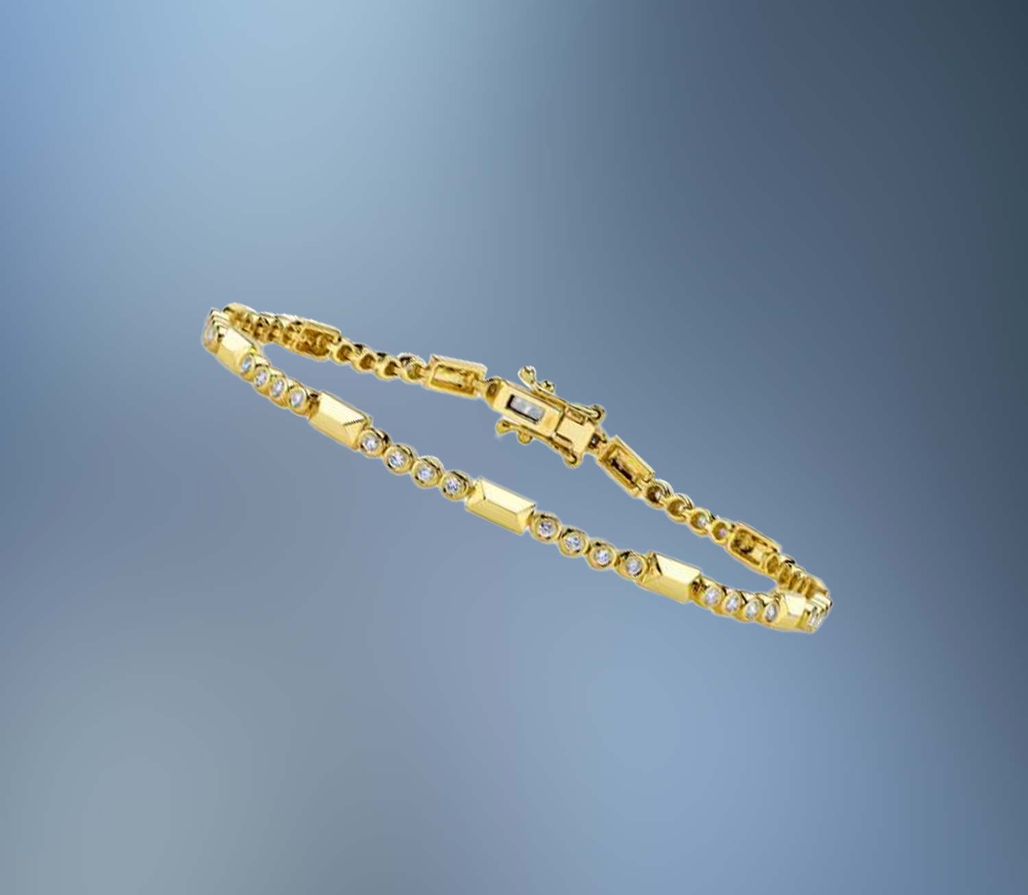 14KT YELLOW GOLD DIAMOND BRACELET CONTAINING .56 CTS. OF NATURAL ROUND BRILLIANT CUT DIAMONDS WITH A HIDDEN BOX CLOSURE