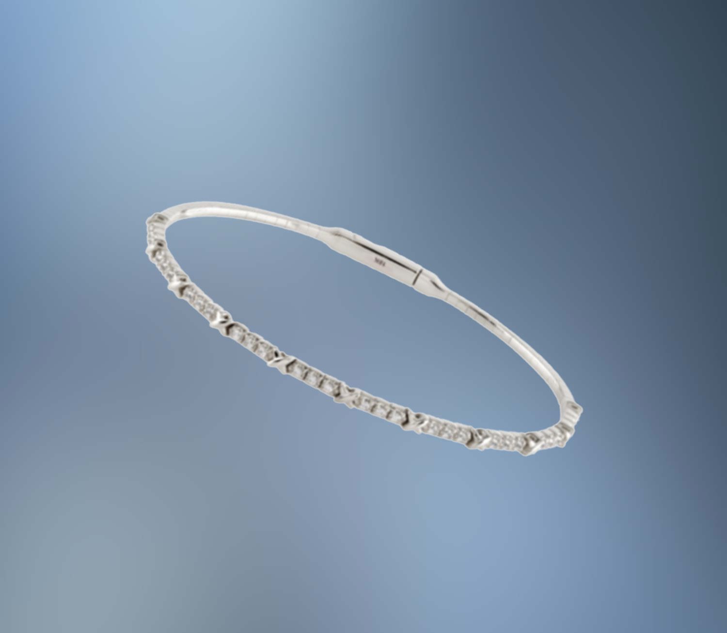 ONE 14KT WHITE GOLD DIAMOND FLEXIBLE BANGLE