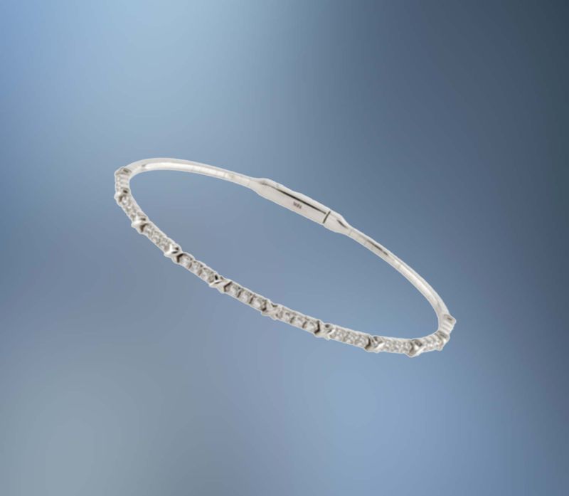ONE 14KT WHITE GOLD DIAMOND FLEXIBLE BANGLE