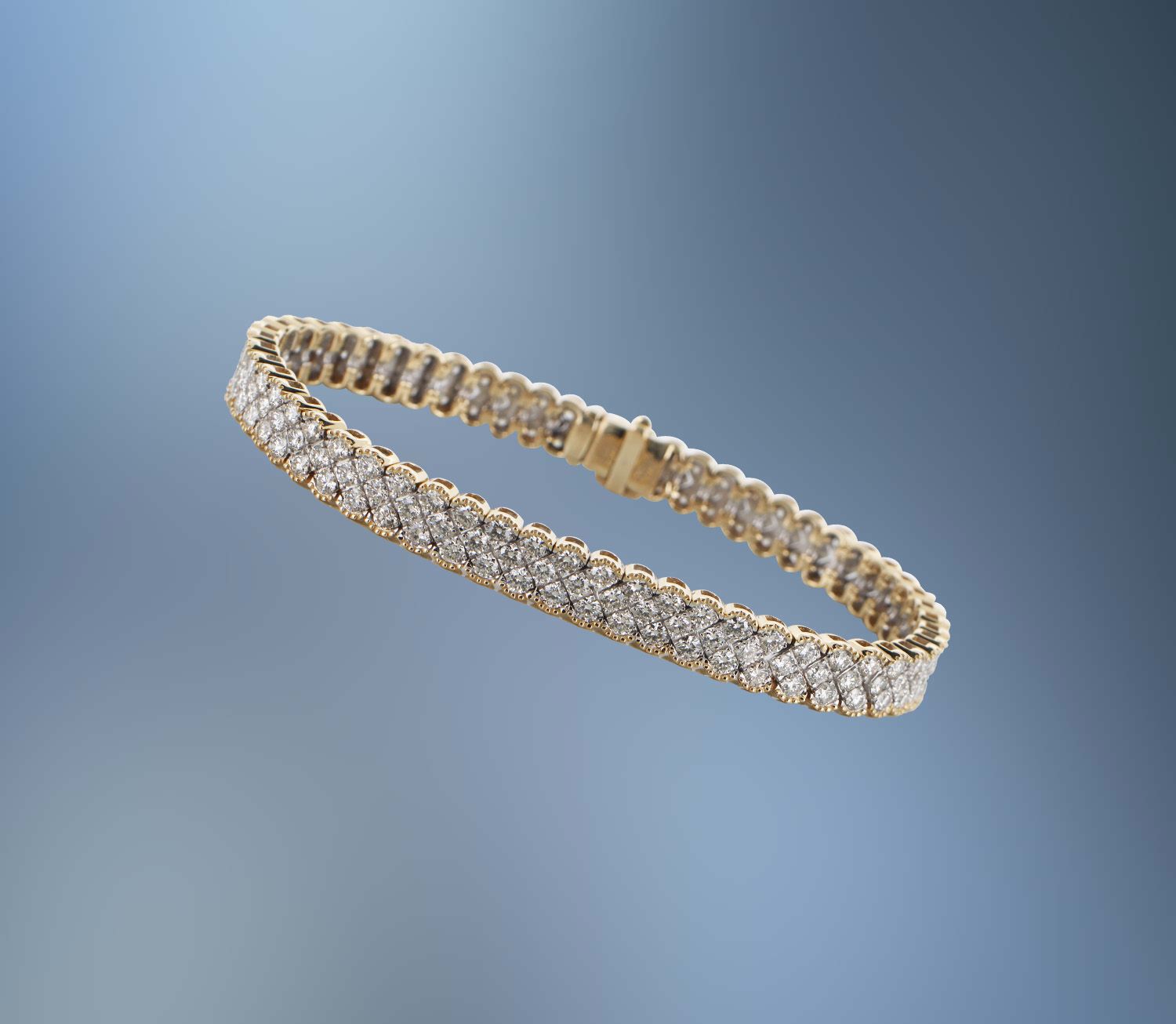 ONE 14KT TWO TONE DIAMOND BRACELET