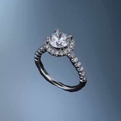14 KT WHITE GOLD HALO STYLE ENGAGEMENT RING FEATURING DIAMONDS TOTALING .47 CTS