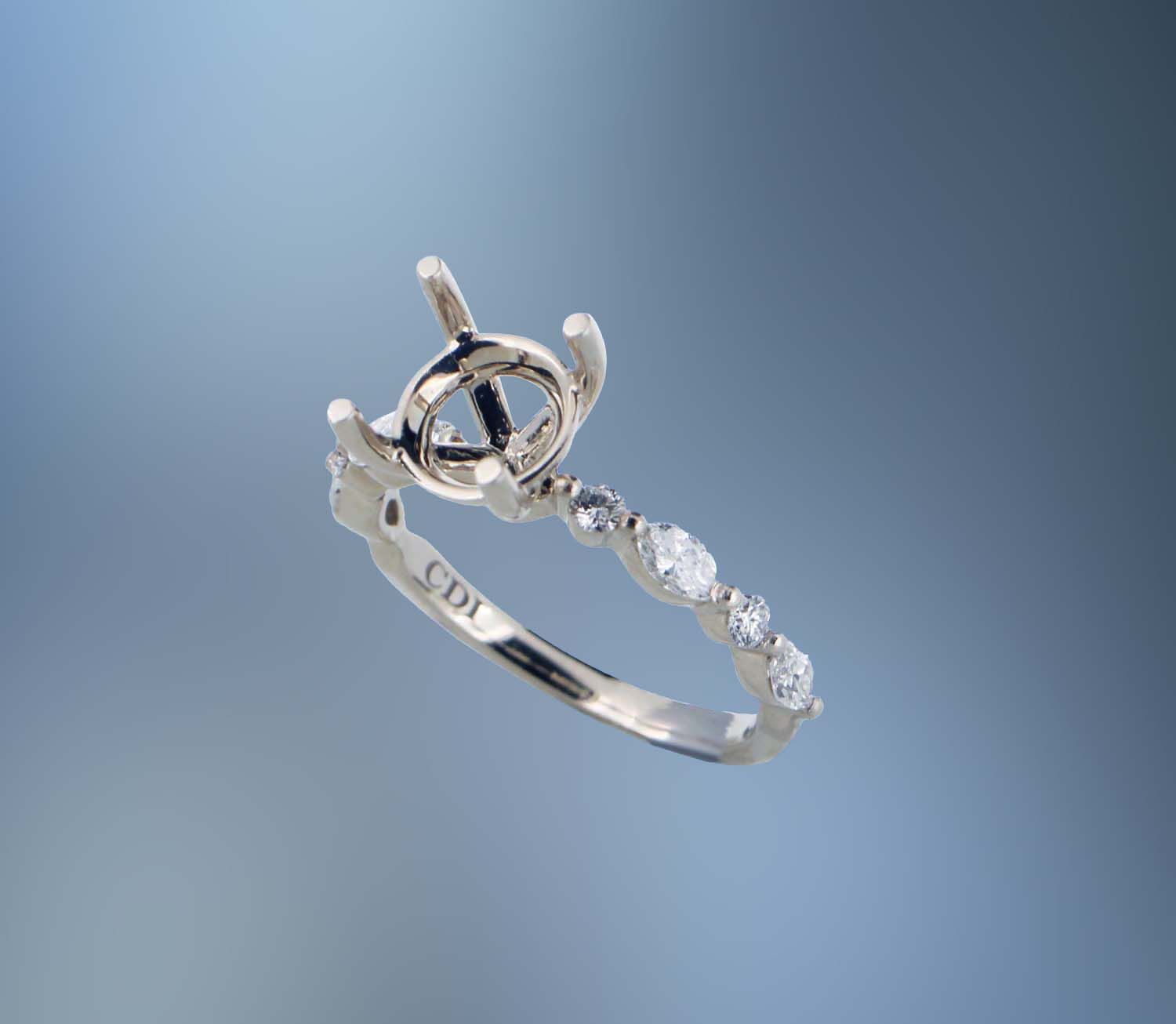14KT WHITE GOLD ENGAGEMENT RING FEATURING 4 ROUND BRILLIANT CUT DIAMONDS AND  4 MARQUISE DIAMONDS TOTALING 0.36 CTS
