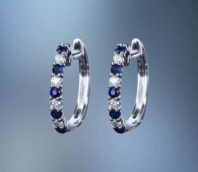 14KT WHITE GOLD SAPPHIRE AND DIAMOND EARRINGS FEATURING 5 SAPPHIRES TOTALING .18 CTS AND 4 DIAMONDS TOTALING .10 CTS 14KT WHITE GOLD SAPPHIRE AND DIAMOND EARRINGS FEATURING 5 SAPPHIRES TOTALING .18 CTS AND 4 DIAMONDS TOTALING .10 CTS