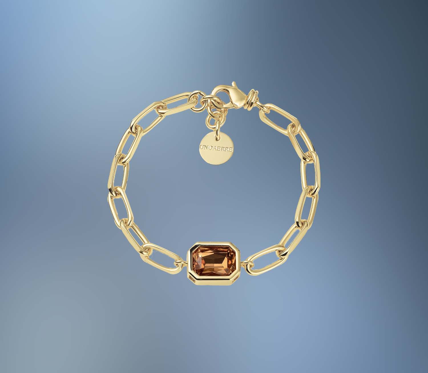 ONE BRONZE/24KT OVERLAY FANCY LINK BRACELET WITH AN ORANGE CRYSTAL